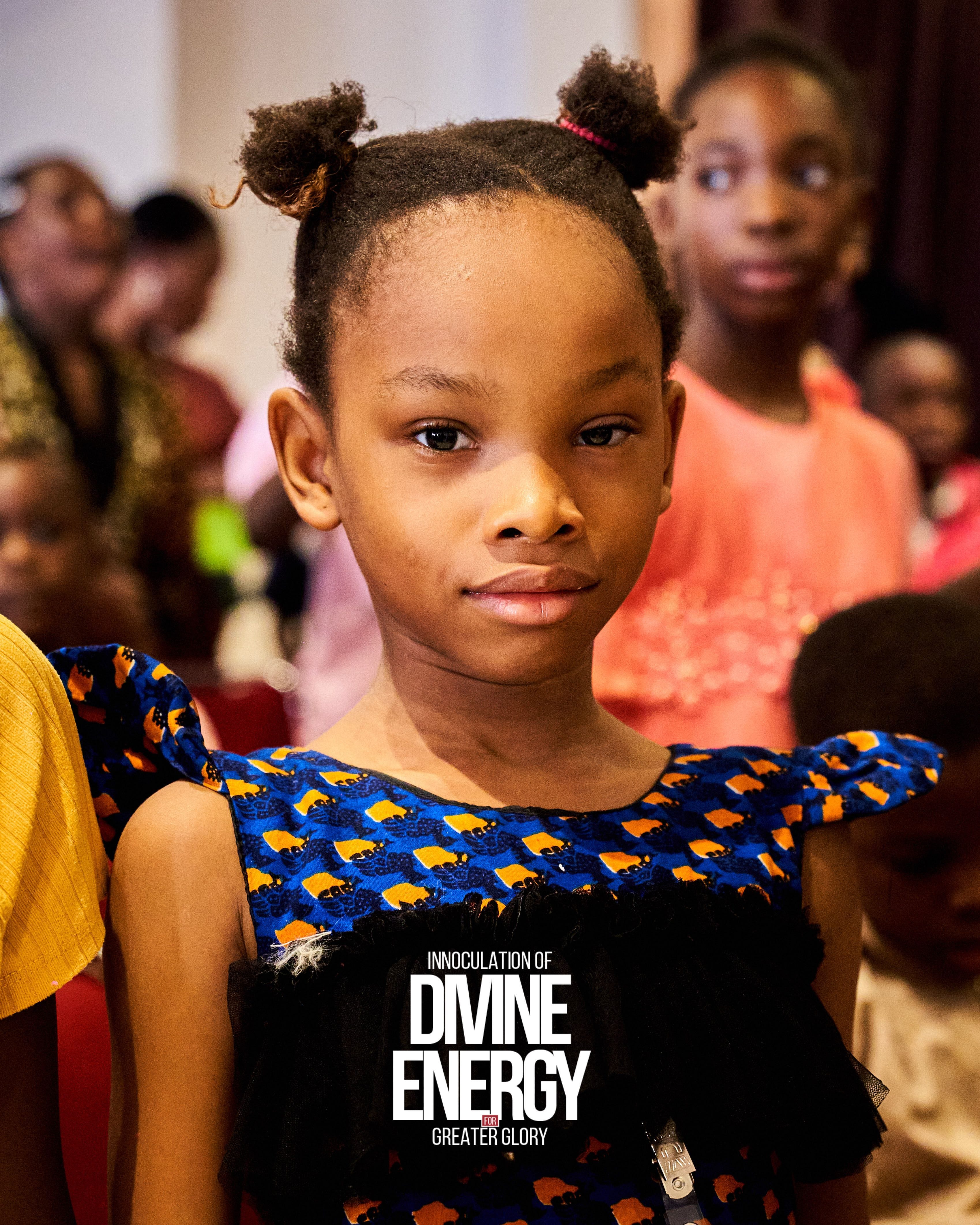 Young girl in colorful ankara dress during Destiny Molders service