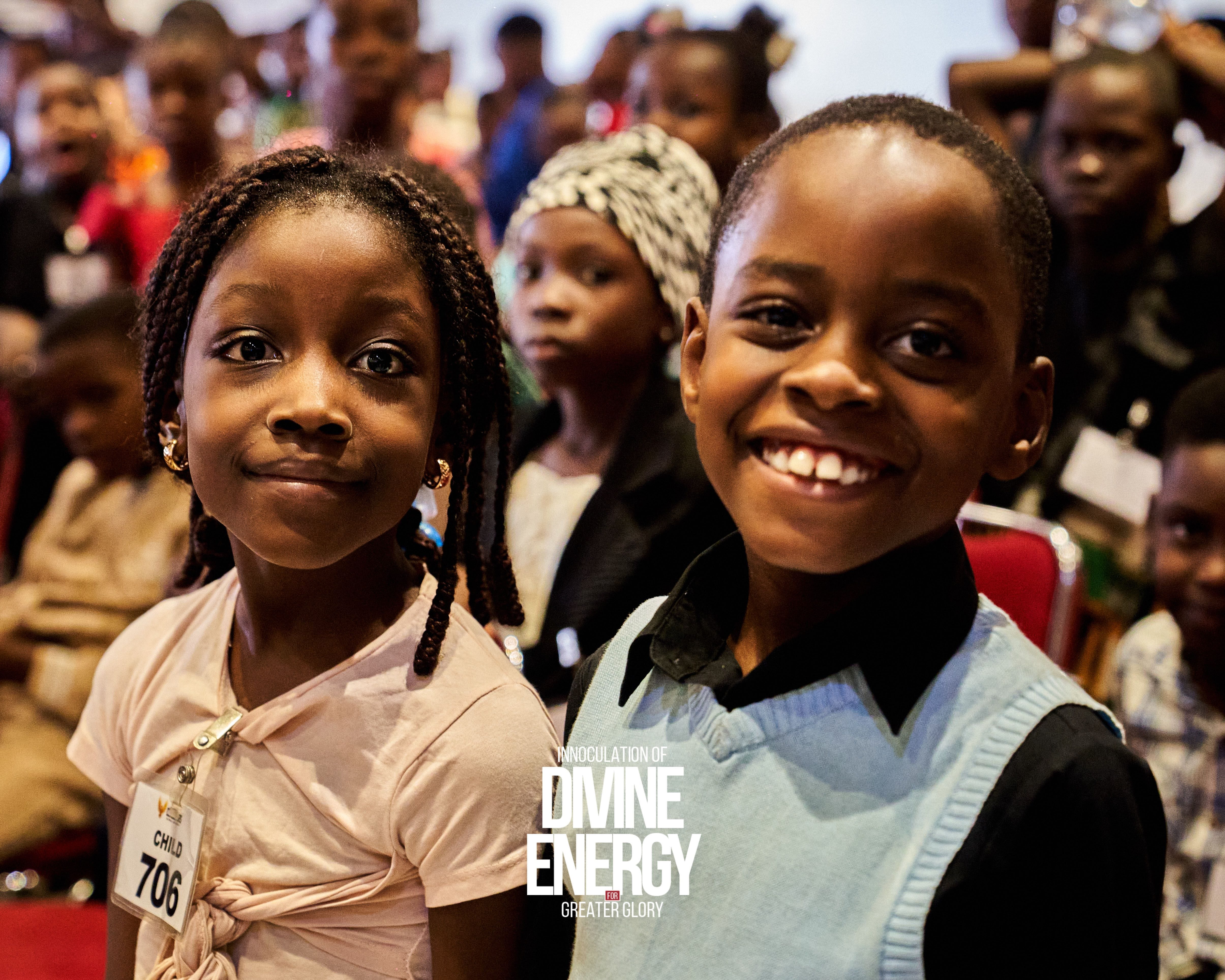 Two children smiling together at a Destiny Molders gathering