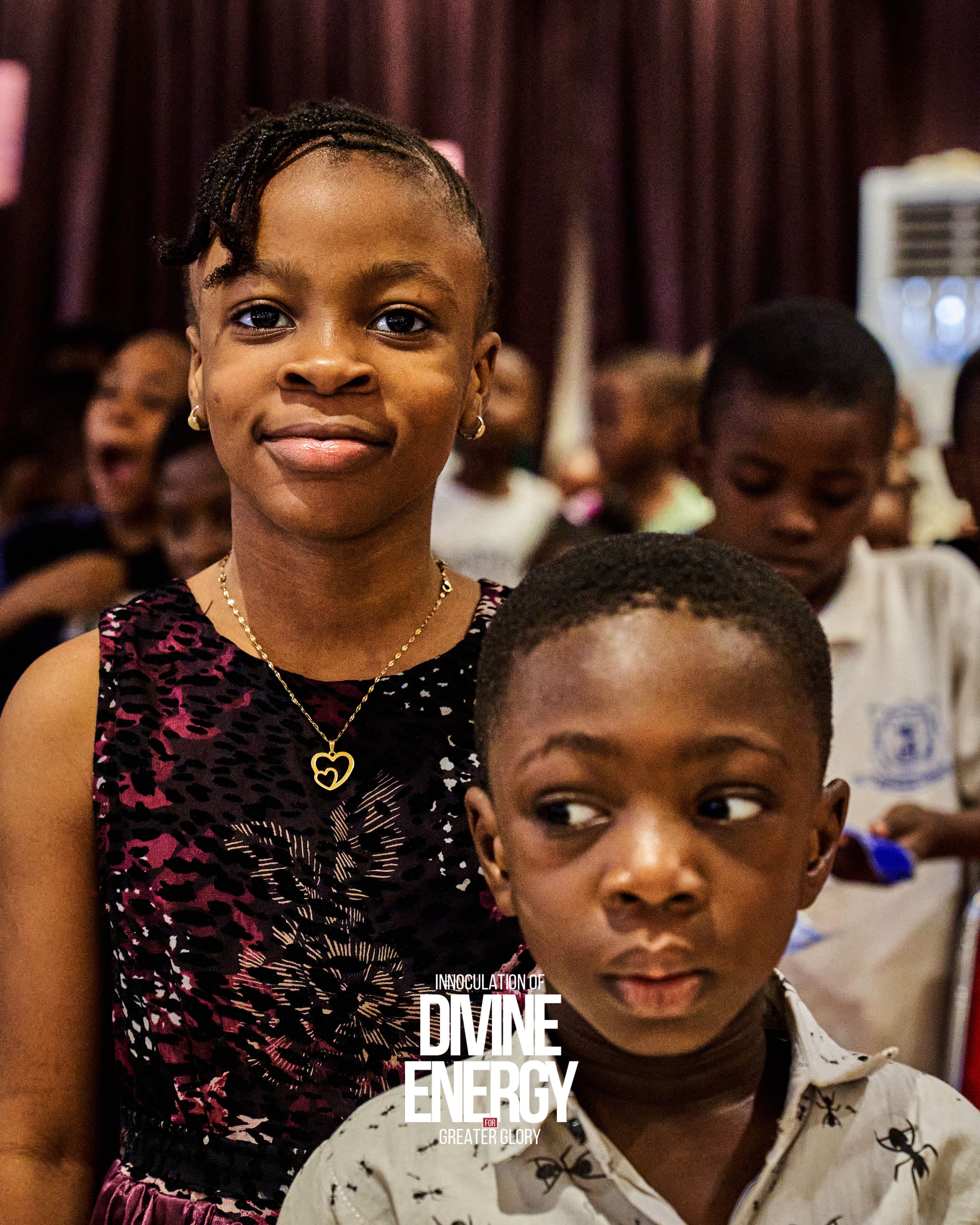 Children standing together at church ministry event